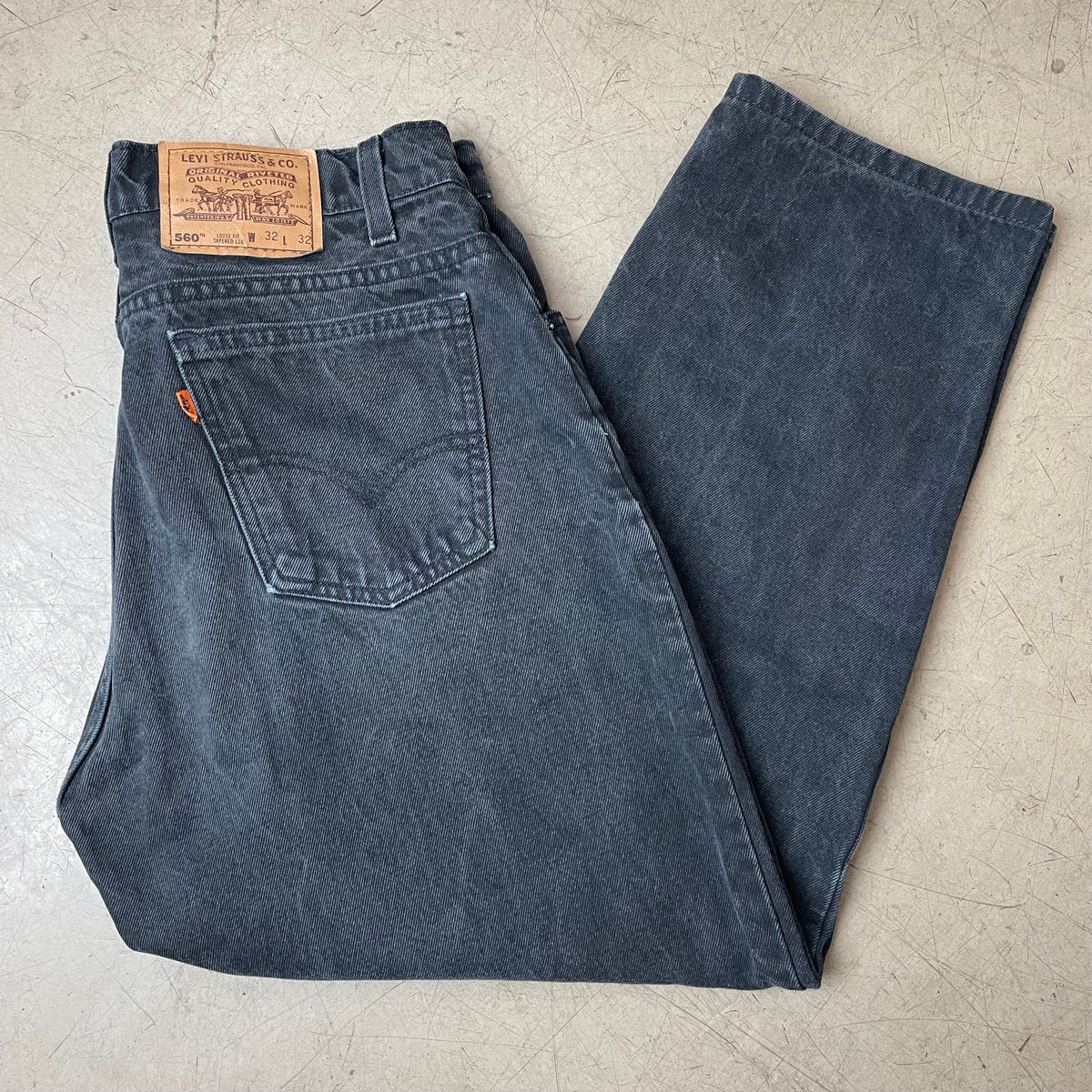 (M) Vintage Levi’s 560 Orange Label Jeanshose faded black W32/L32